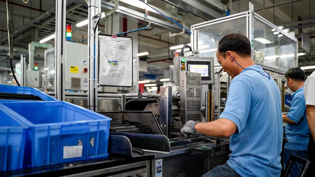 Workers work in the Bosch Shenzhen plant.
