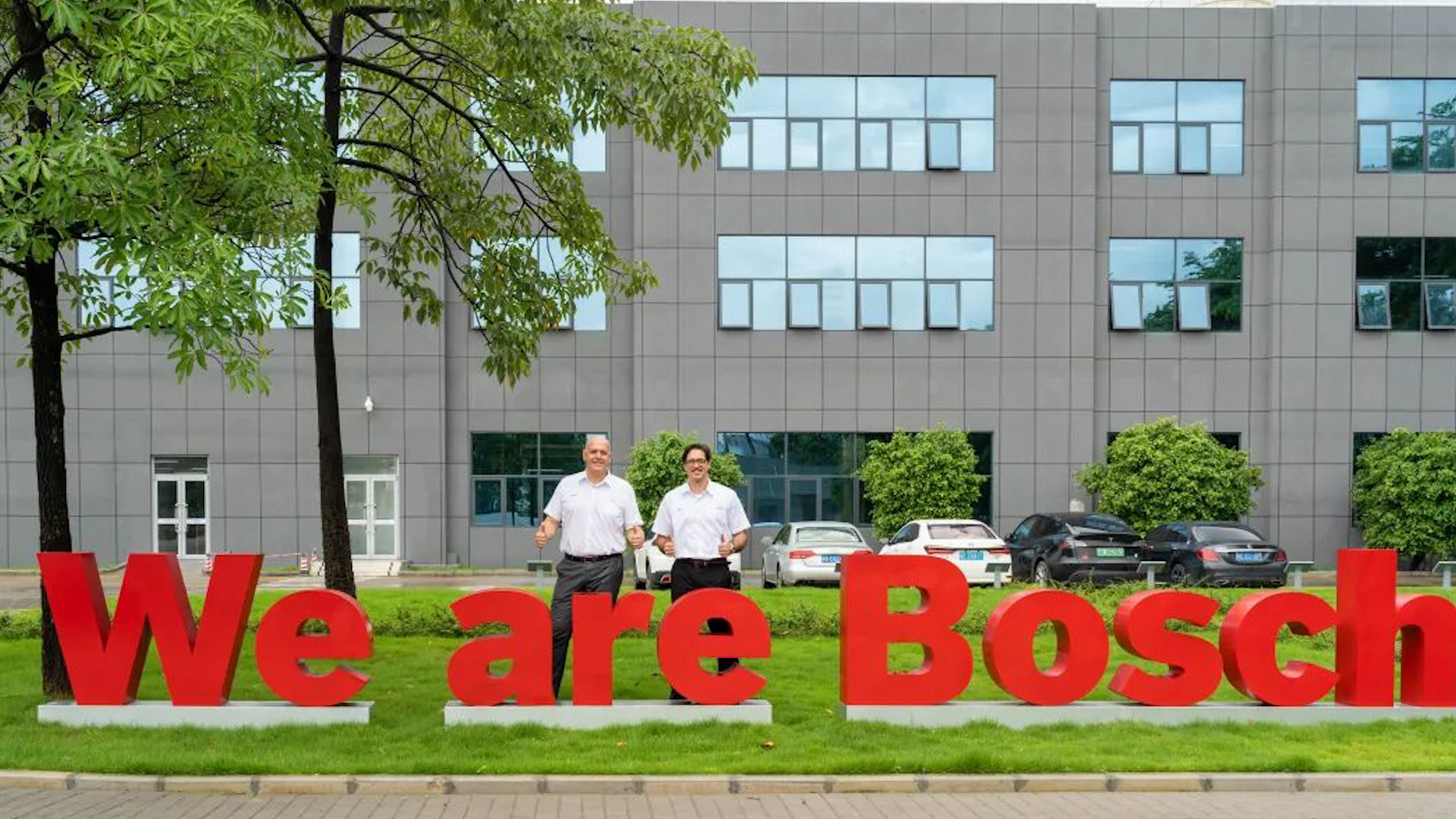 Marco Morea (L) and Sebastian Hardt pose for a photo at the Bosch Shenzhen plant.