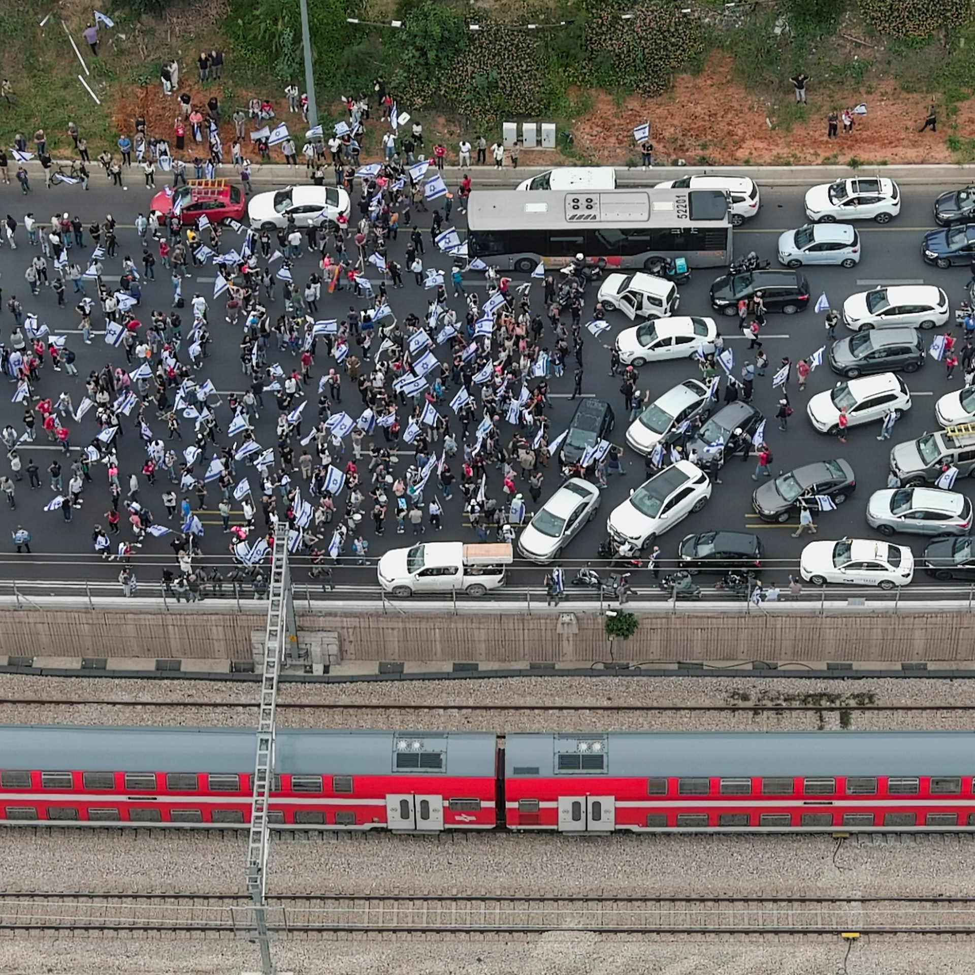 Israel protests continue as law passes protecting Netanyahu's office