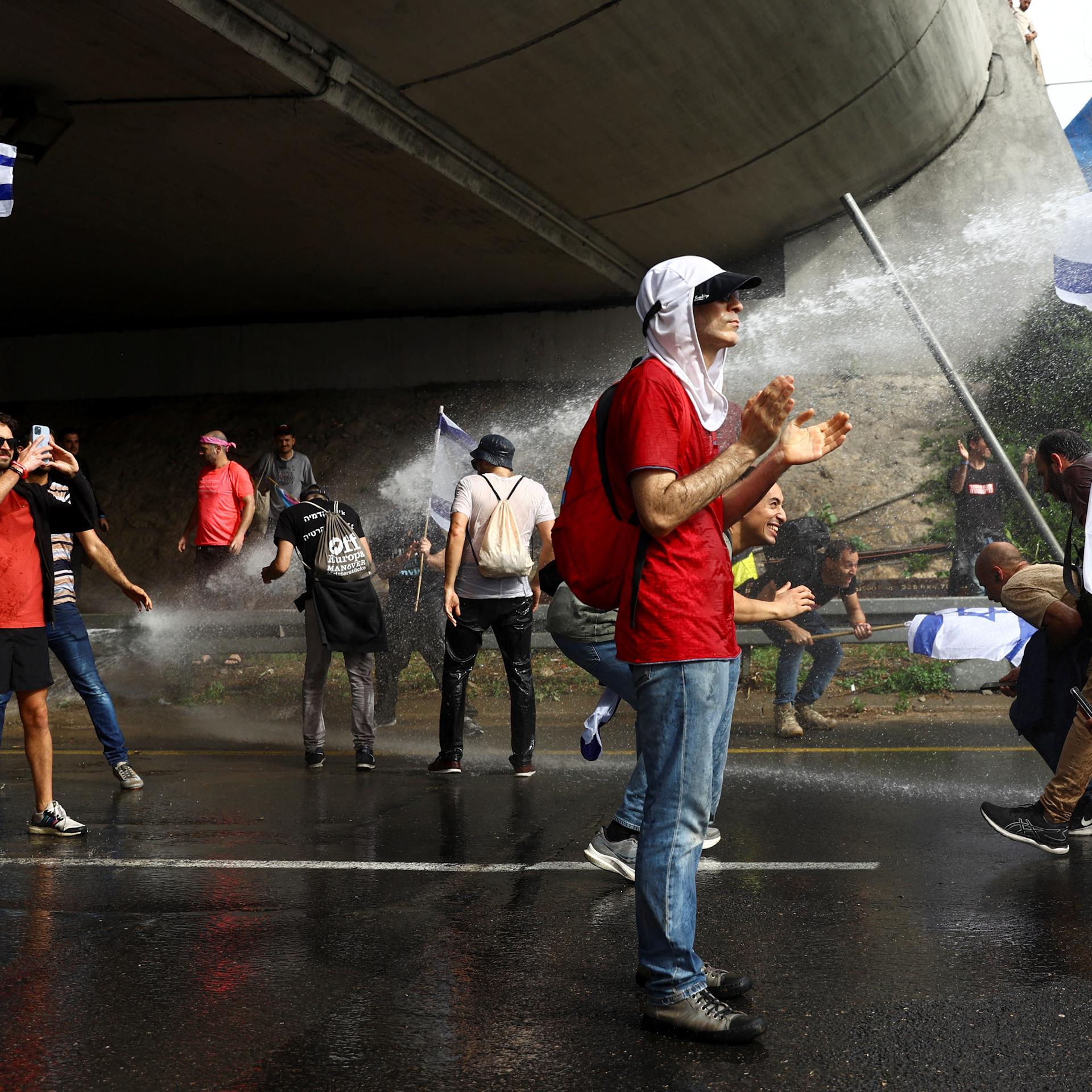 Israel protests continue as law passes protecting Netanyahu's office