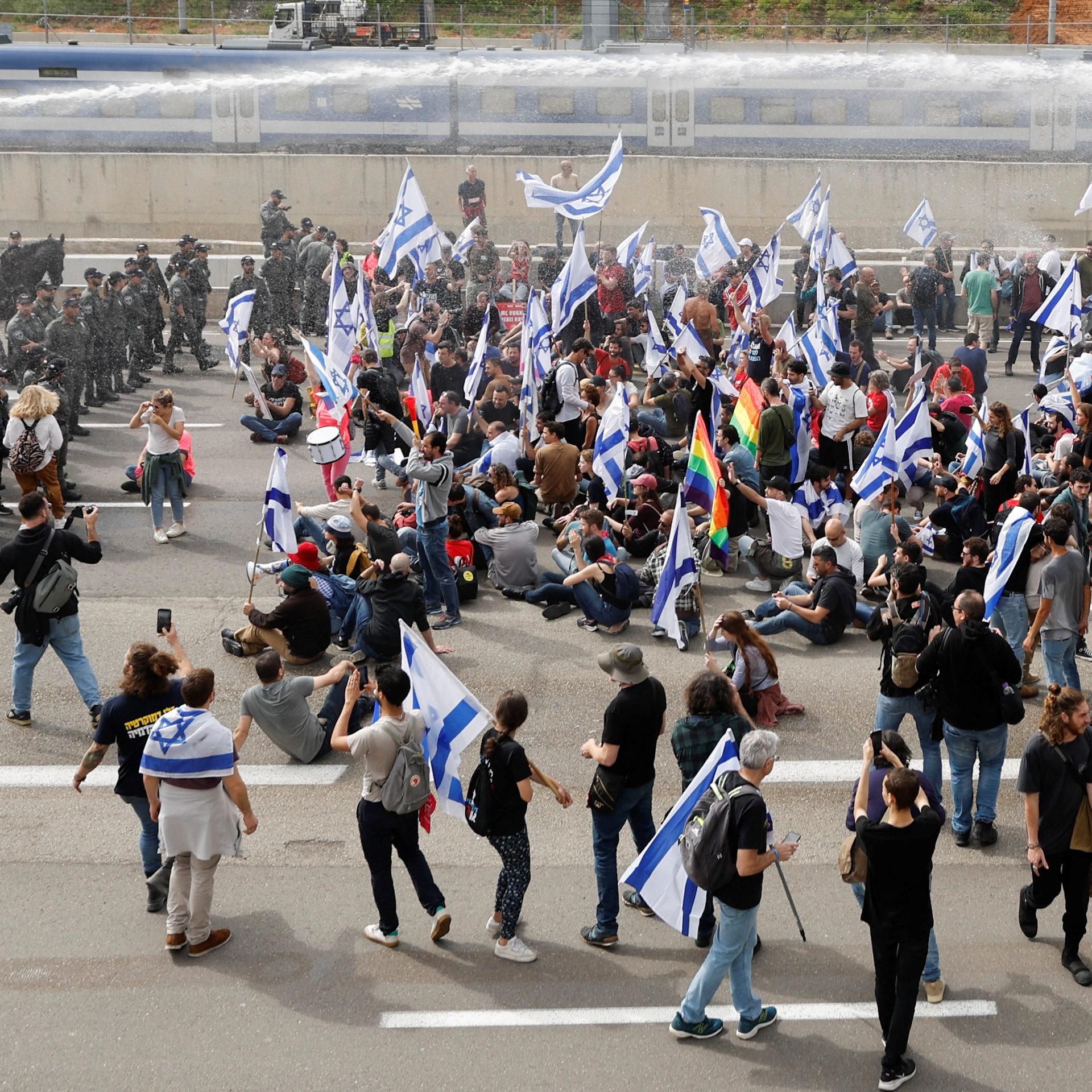 Israel protests continue as law passes protecting Netanyahu's office