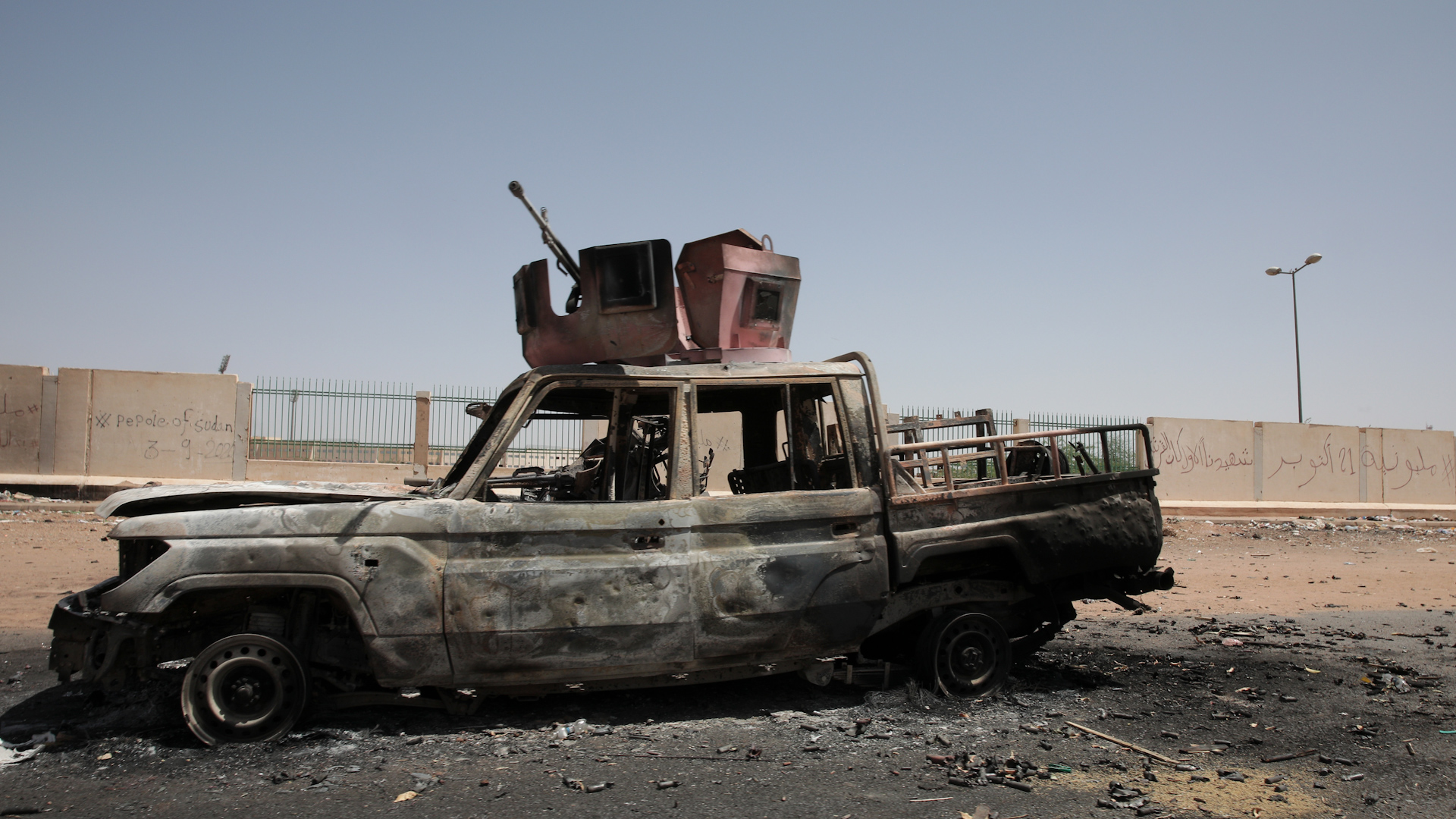 Destroyed military vehicles are seen in southern in Khartoum, Sudan, Thursday, April 20, 2023. The latest attempt at a cease-fire between the rival Sudanese forces faltered as gunfire rattled the capital of Khartoum. Through the night and into Thursday morning, gunfire could be heard almost constantly across Khartoum. (AP Photo/Marwan Ali)