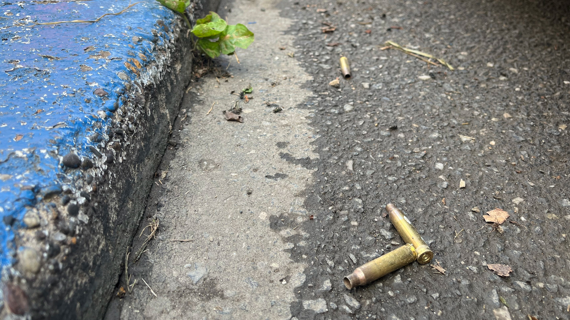 Bullet shells litter the street in Philadelphia, Pennsylvania after a mass shooting left at least five dead and two injured.