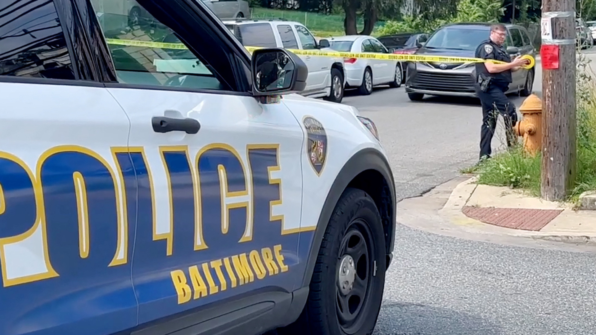 The scene after a mass shooting where at least 30 people were shot at a Baltimore, Maryland block party.