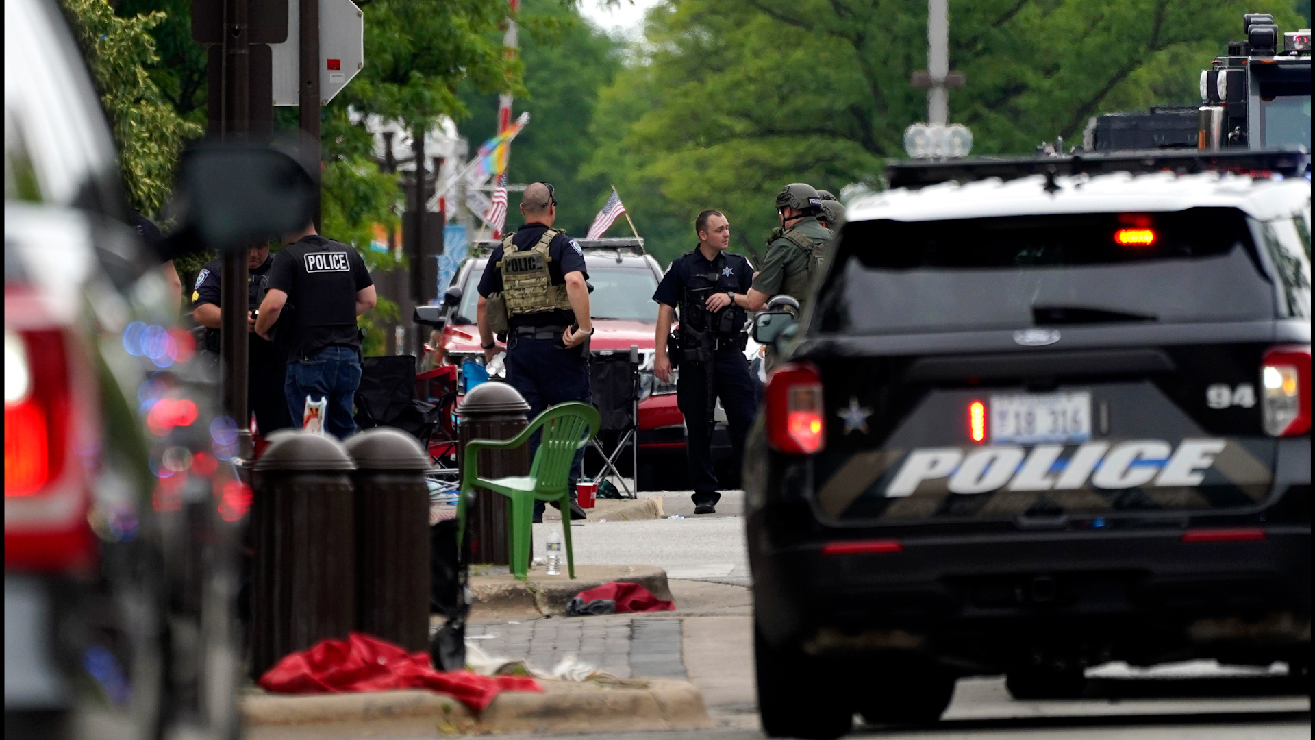 Empty chairs are seen on the street after a mass shooting at the Highland Park Fourth of July parade in downtown Highland Park, Ill., a Chicago suburb on Monday, July 4, 2022.