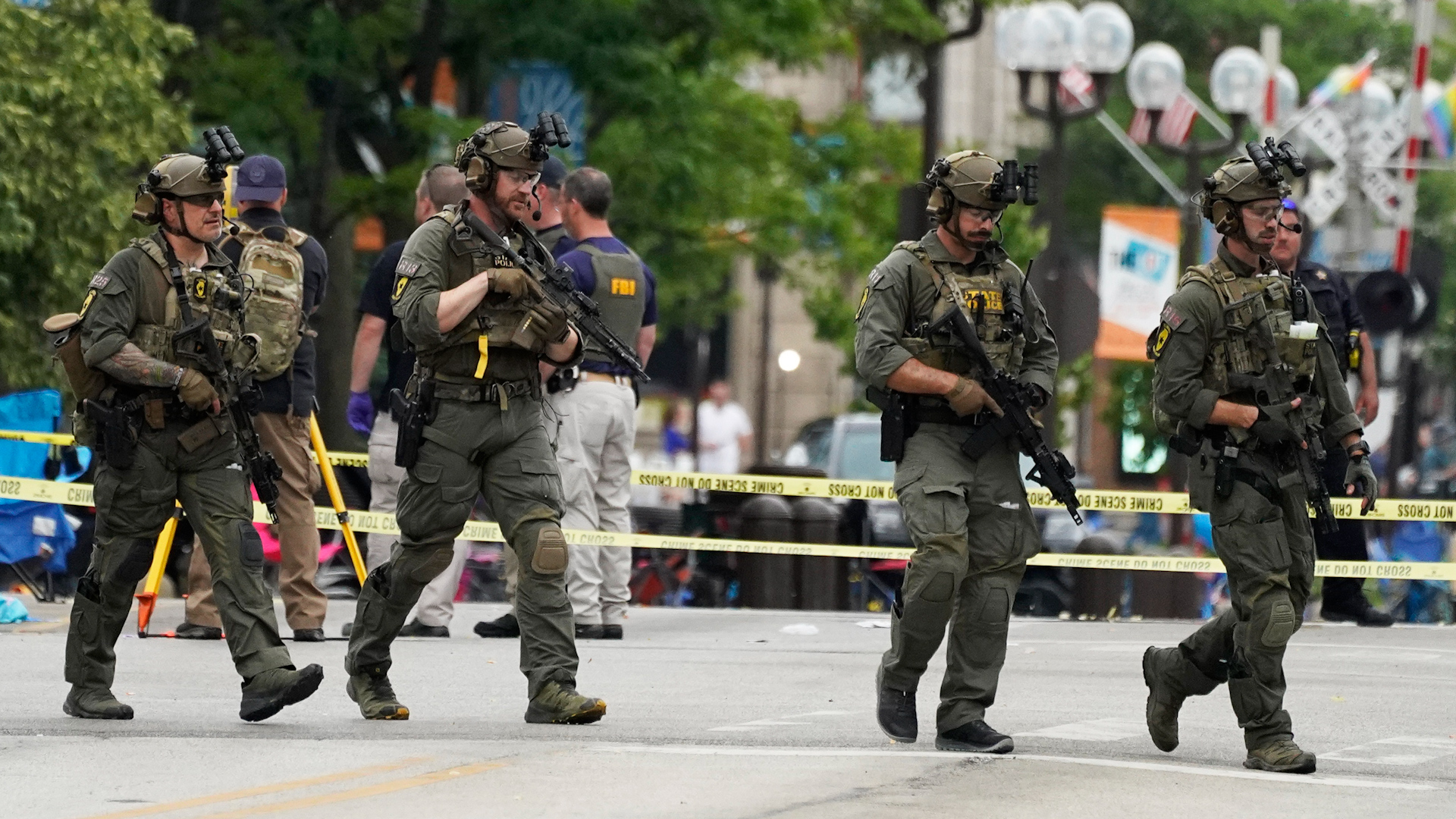 Police on the street after a mass shooting at the Highland Park Fourth of July parade in downtown Highland Park, Ill., a Chicago suburb on Monday, July 4, 2022.