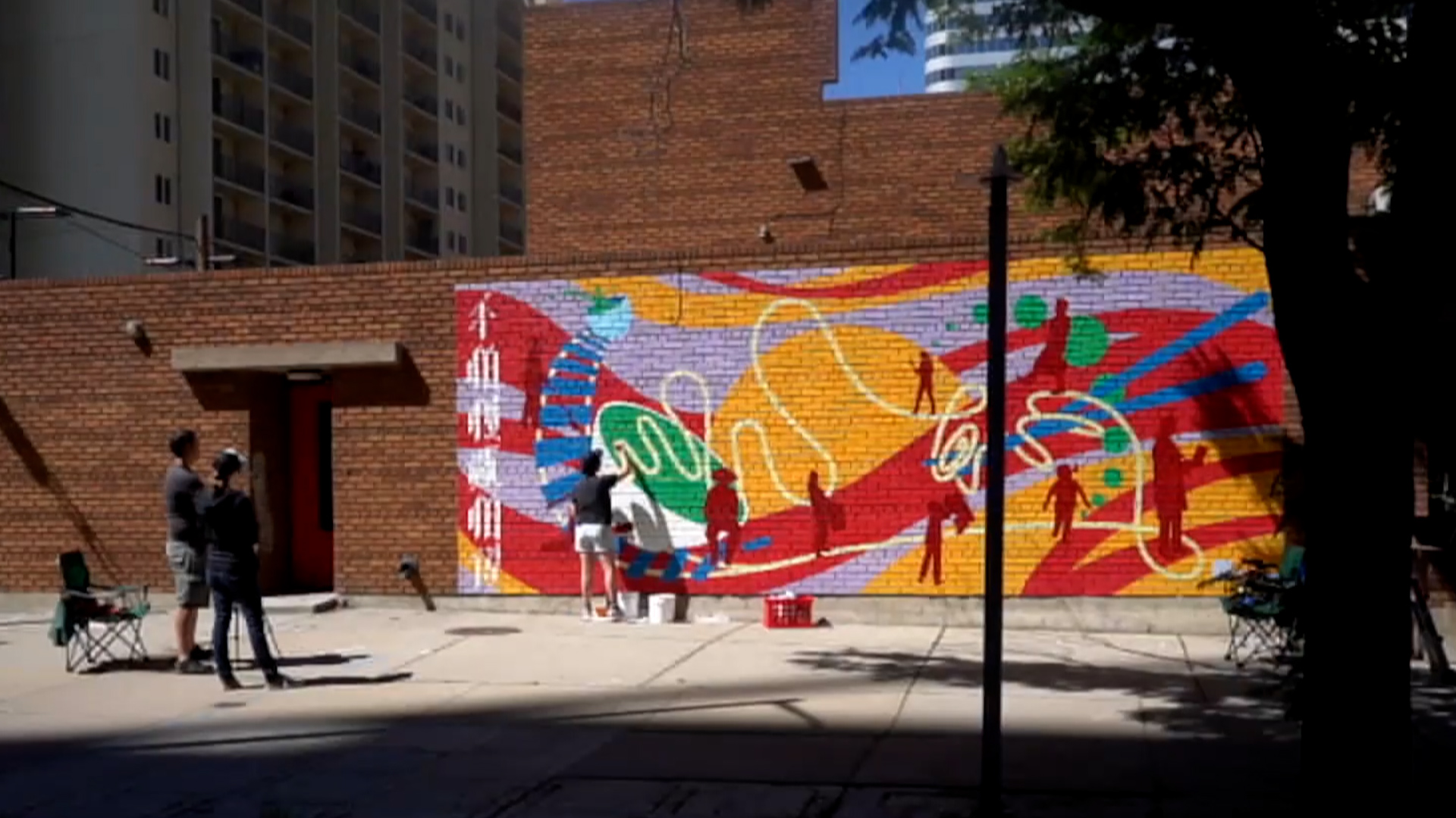 This Incredible Technicolor Street Mural Has Taken Over Doyers St