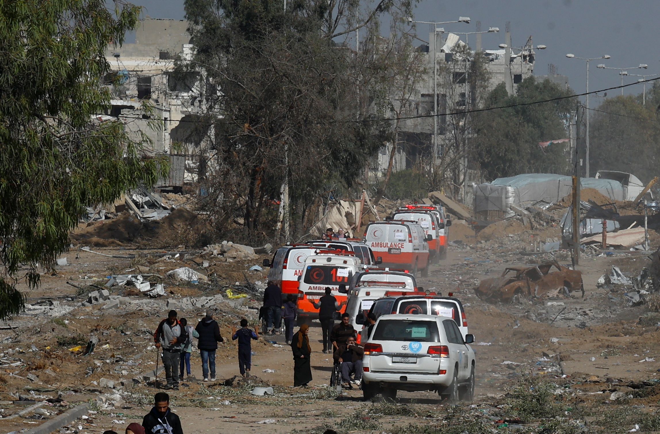 A convoy of ambulances and a UN truck heads towards north Gaza during a temporary truce between Israel and Hamas, near Gaza City November 24, 2023
