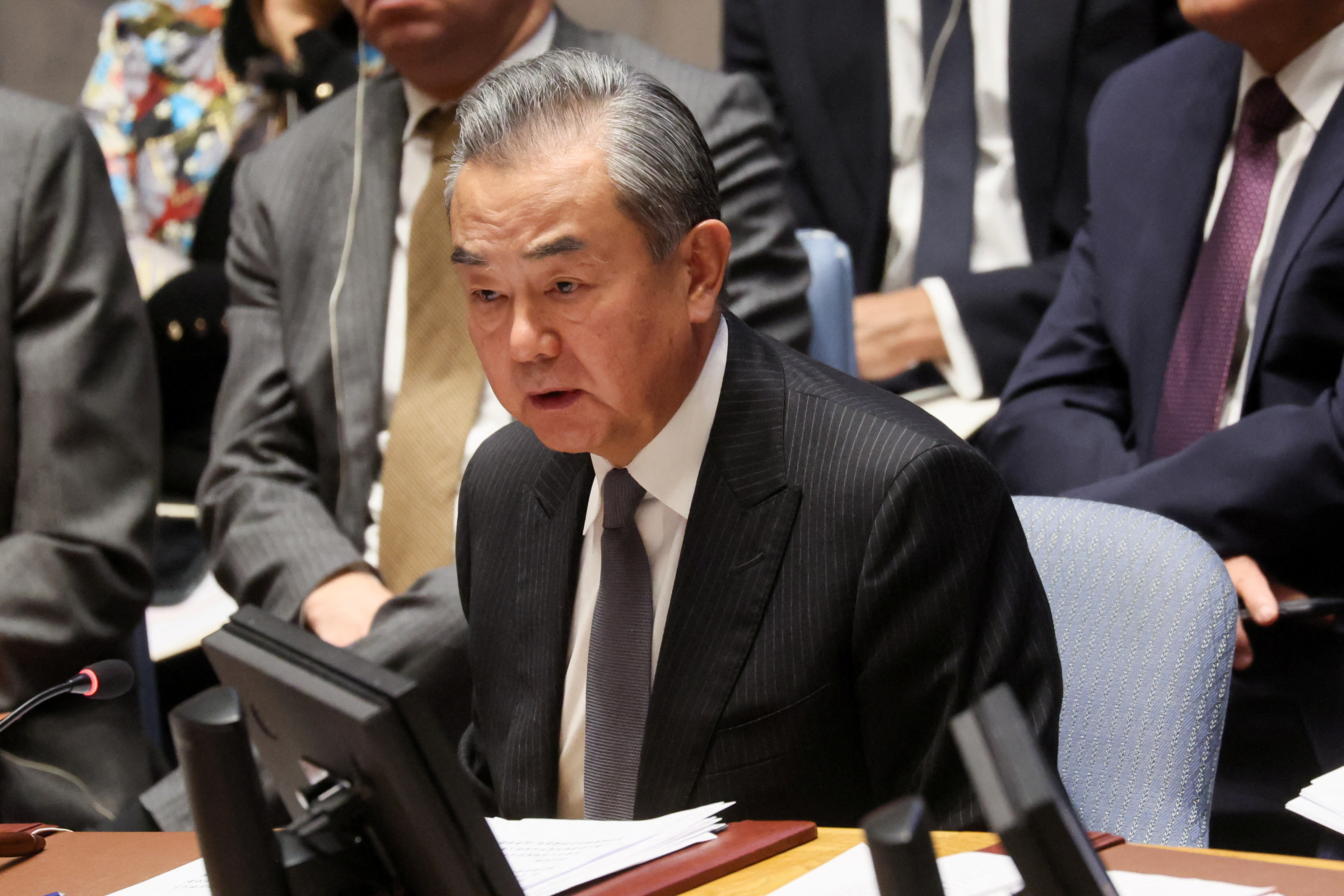 Chinese Foreign Minister Wang Yi chairs a UN Security Council meeting on the conflict between Israel and Hamas, in New York City, November 29, 2023.
