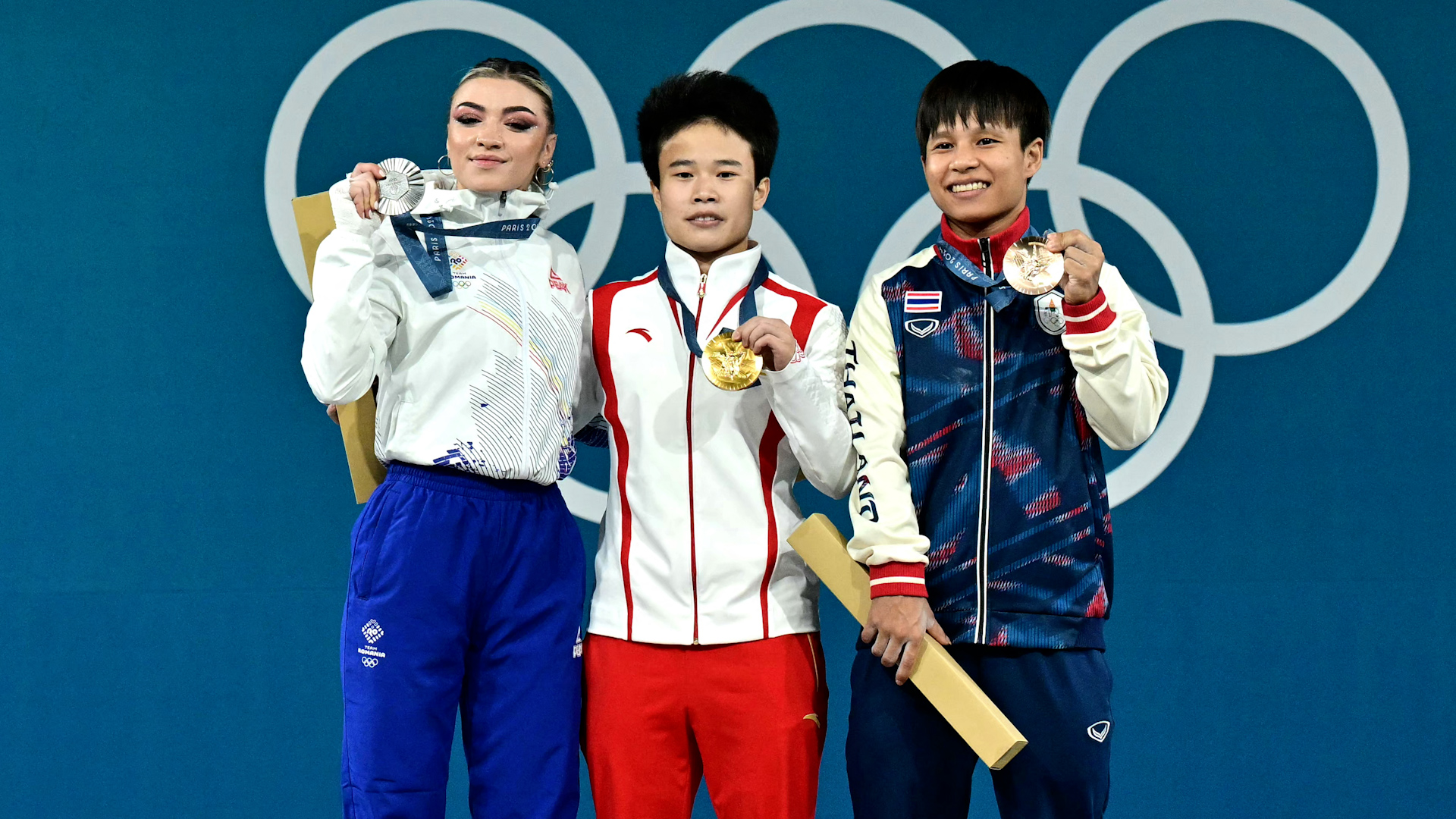 Team China sets Olympic records and wins historic gold on day 12