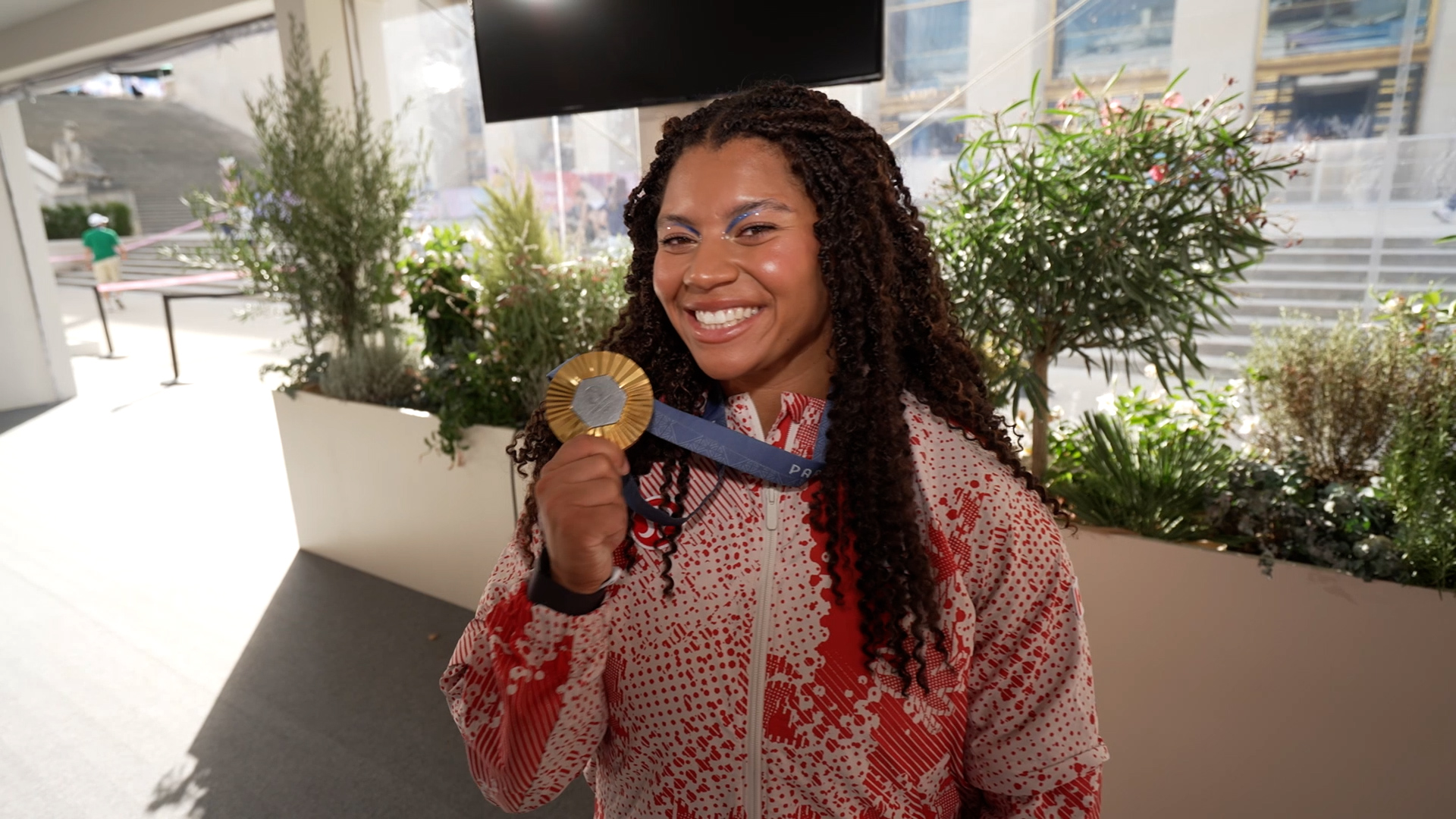 Camryn Rogers talks about winning Olympic gold in hammer throw