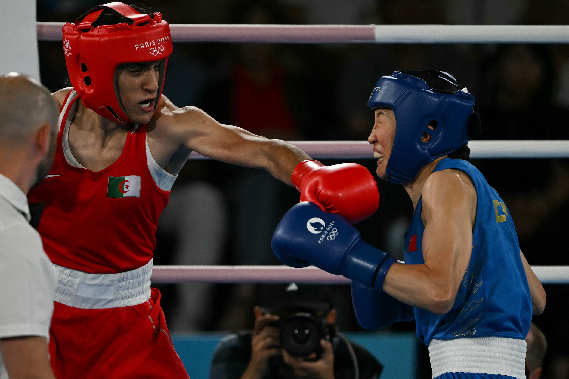 Algeria's Imane Khelif and China's Yang Liu (Blue) compete in the women's 66kg final boxing match during the Paris 2024 Olympic Games on August 9, 2024. Photo: MOHD RASFAN / AFP