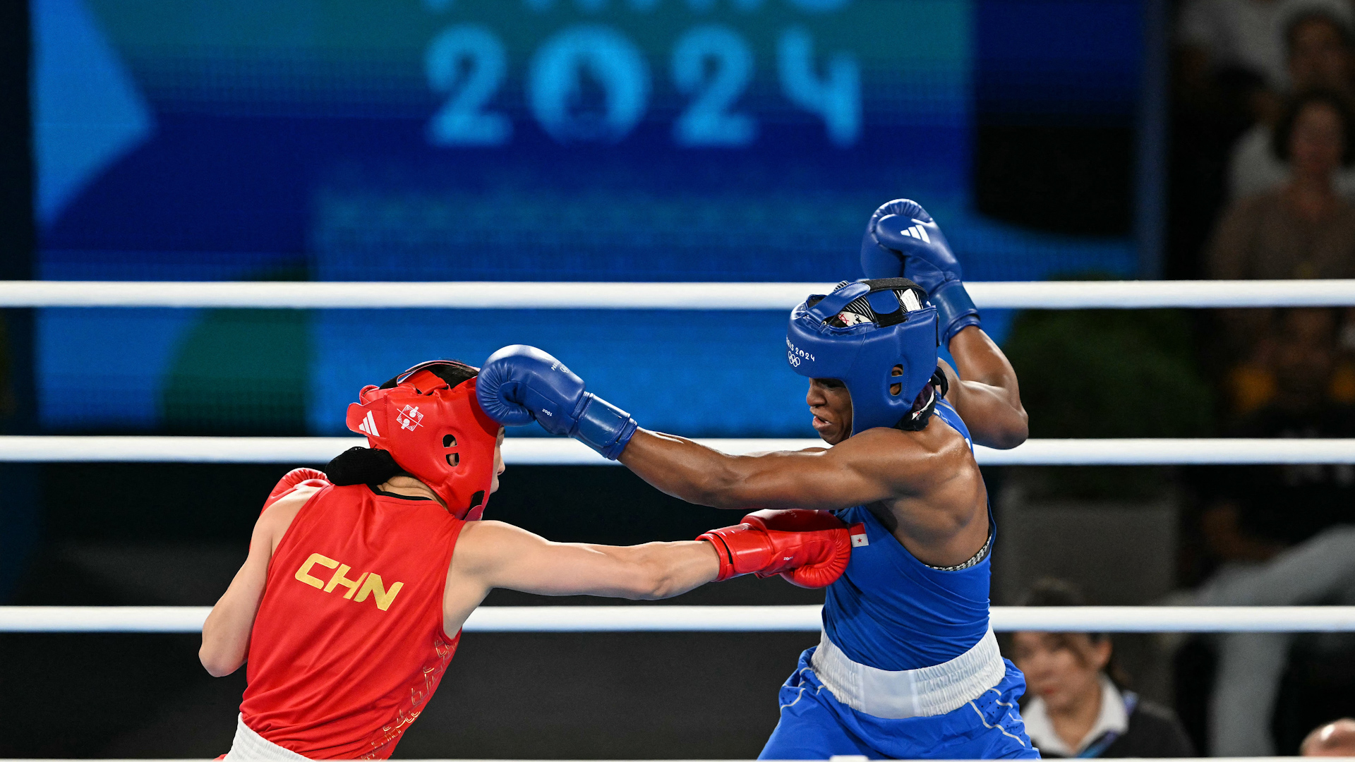 China's Li Qian wins gold and sets new Olympic record in women's boxing