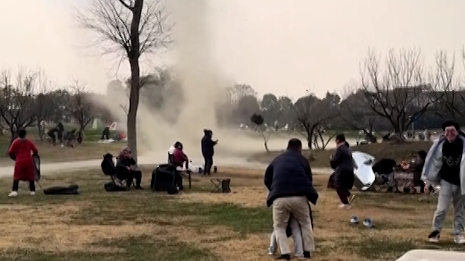 Chengdu residents capture rare tornado scene in a park