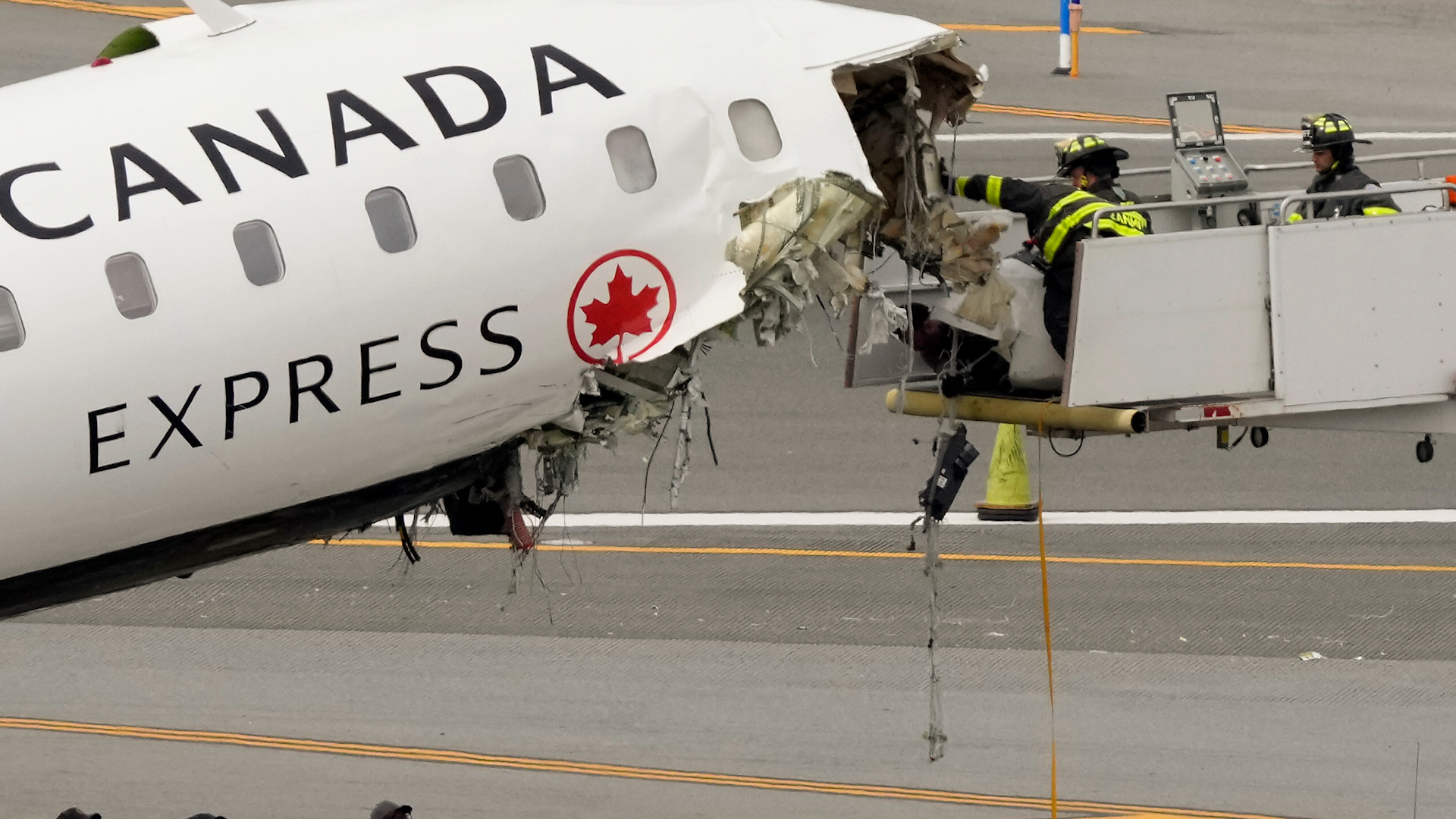 Air Canada wreckage remains at LaGuardia airport 