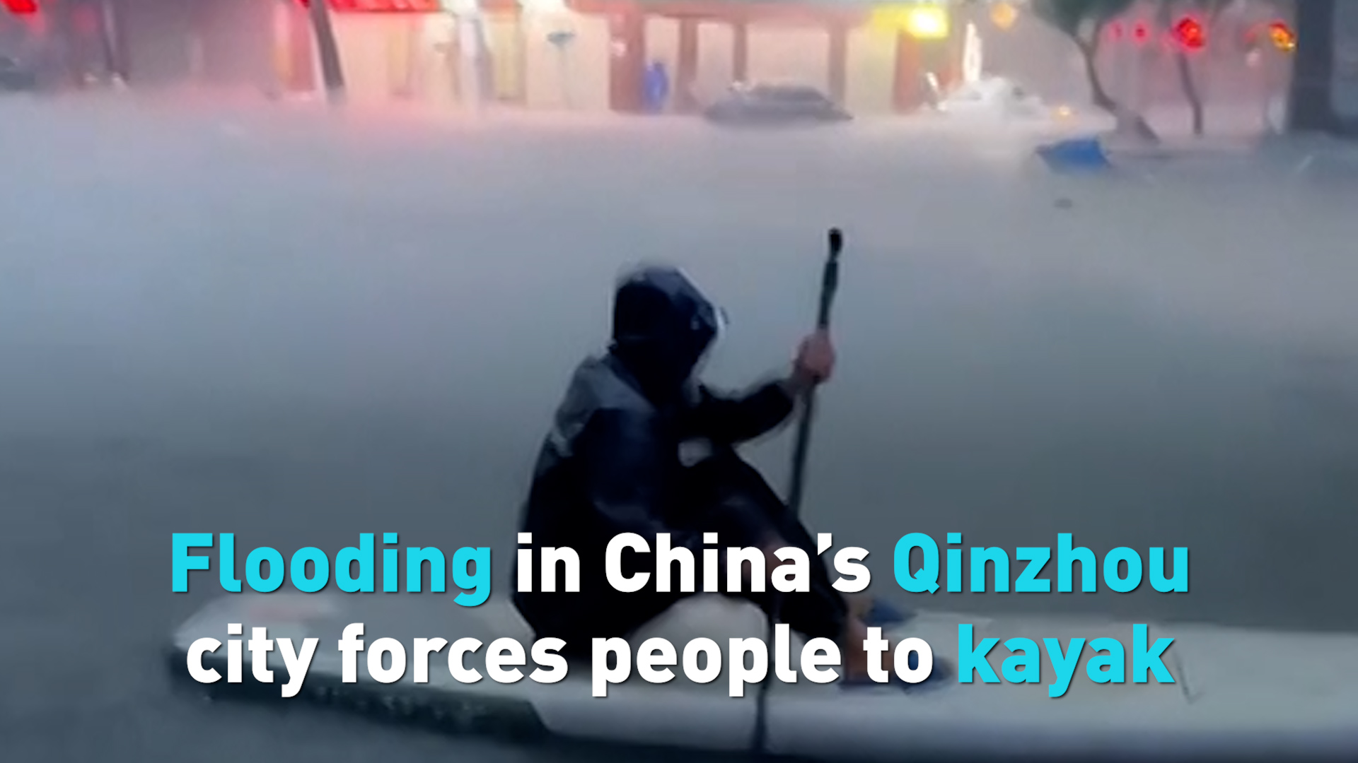 Flooding in China's Qinzhou city forces people to kayak