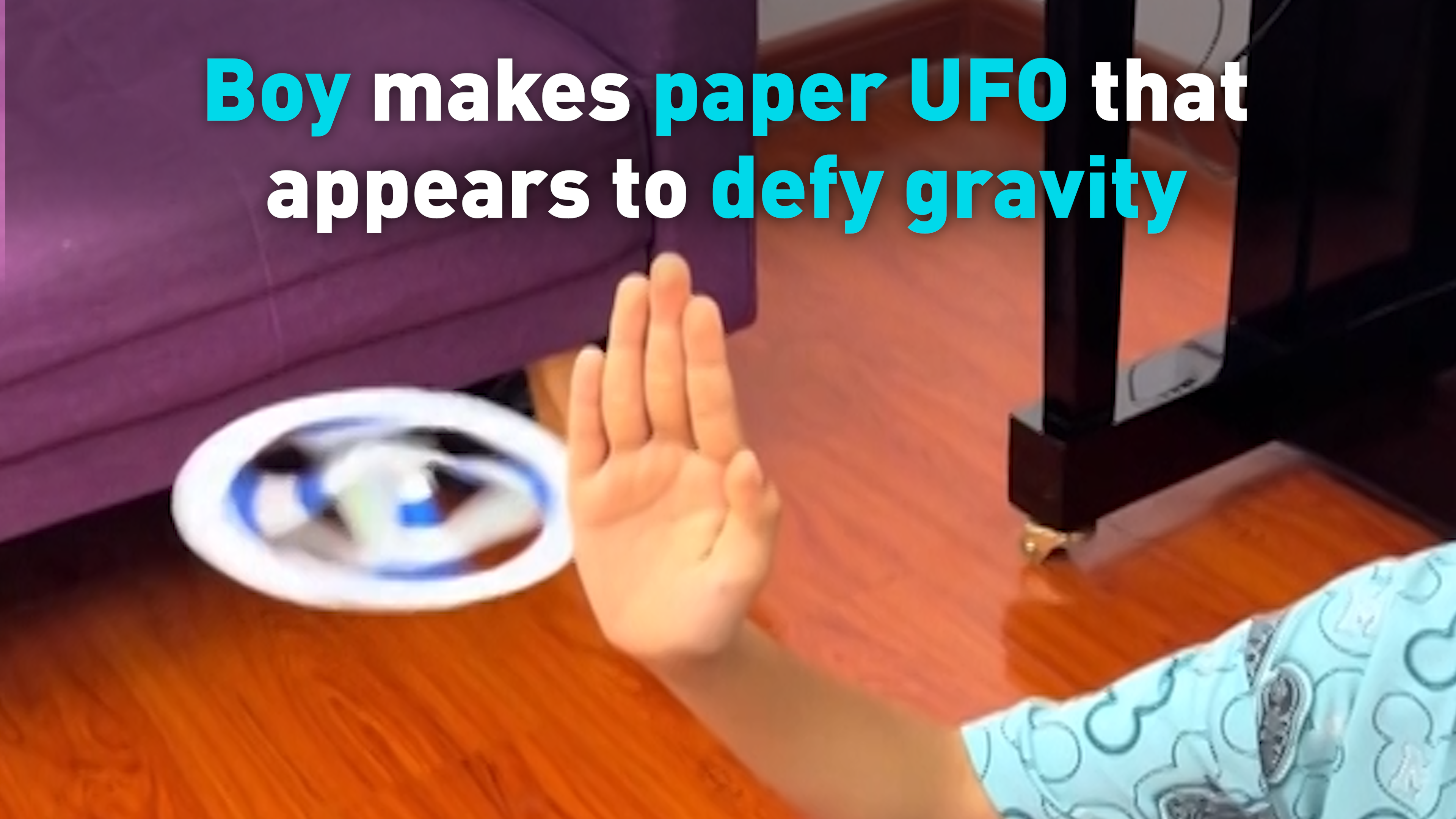 Boy makes paper UFO that appears to defy gravity