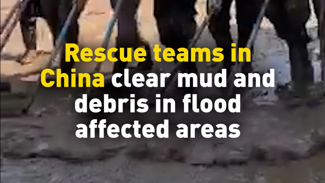 Rescue teams in China clear mud and debris in flood affected areas
