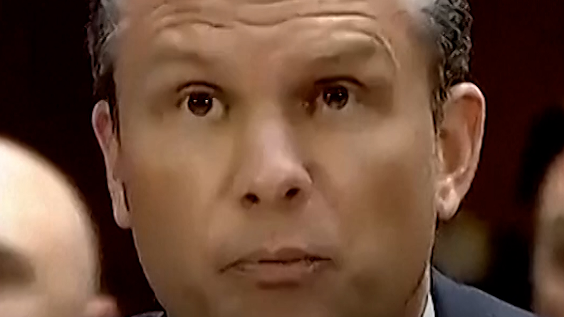 Protesters interrupt Pete Hegseth during hearing