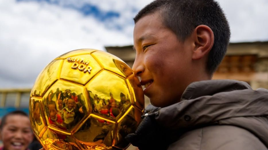 Young Chinese Players Celebrate World Cup In Xizang 