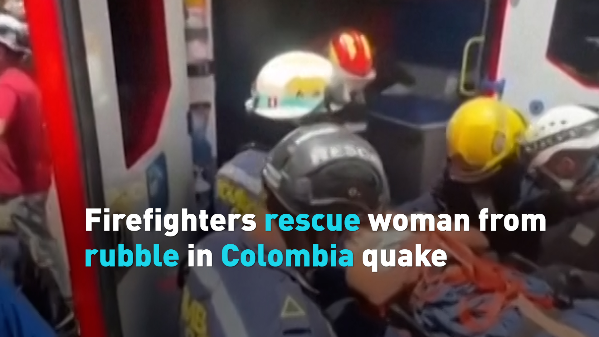 Firefighters rescue woman from rubble in Colombia quake