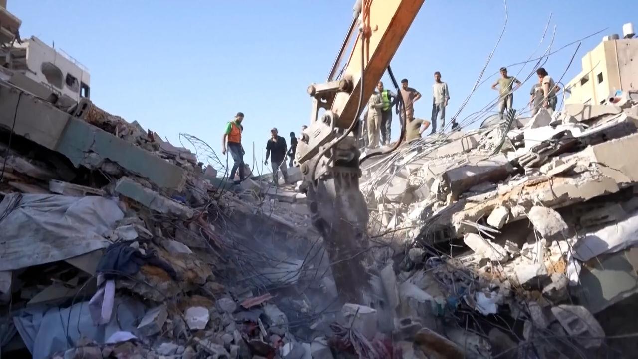 Gaza building collapse kills 21, including 11 children