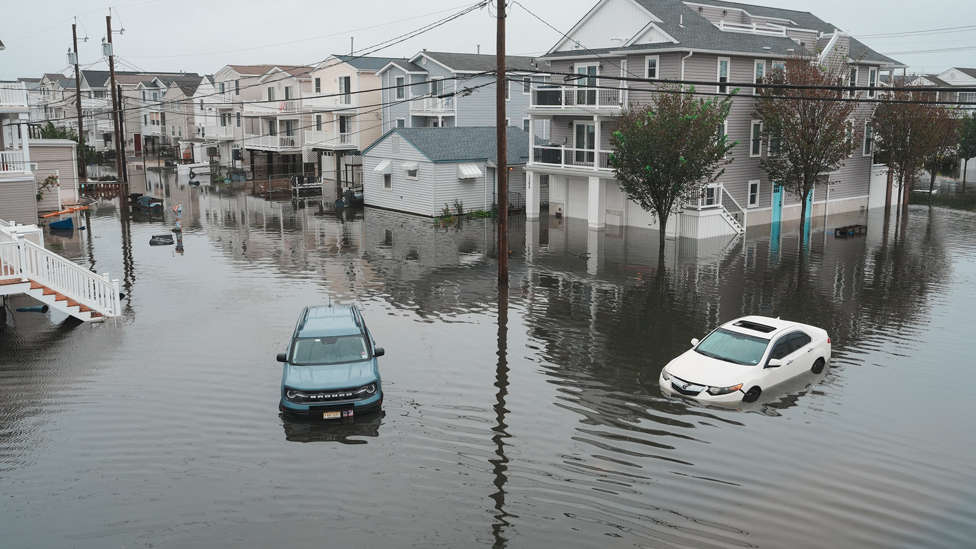 Northeast cities trudge through floodwaters after powerful nor'easter