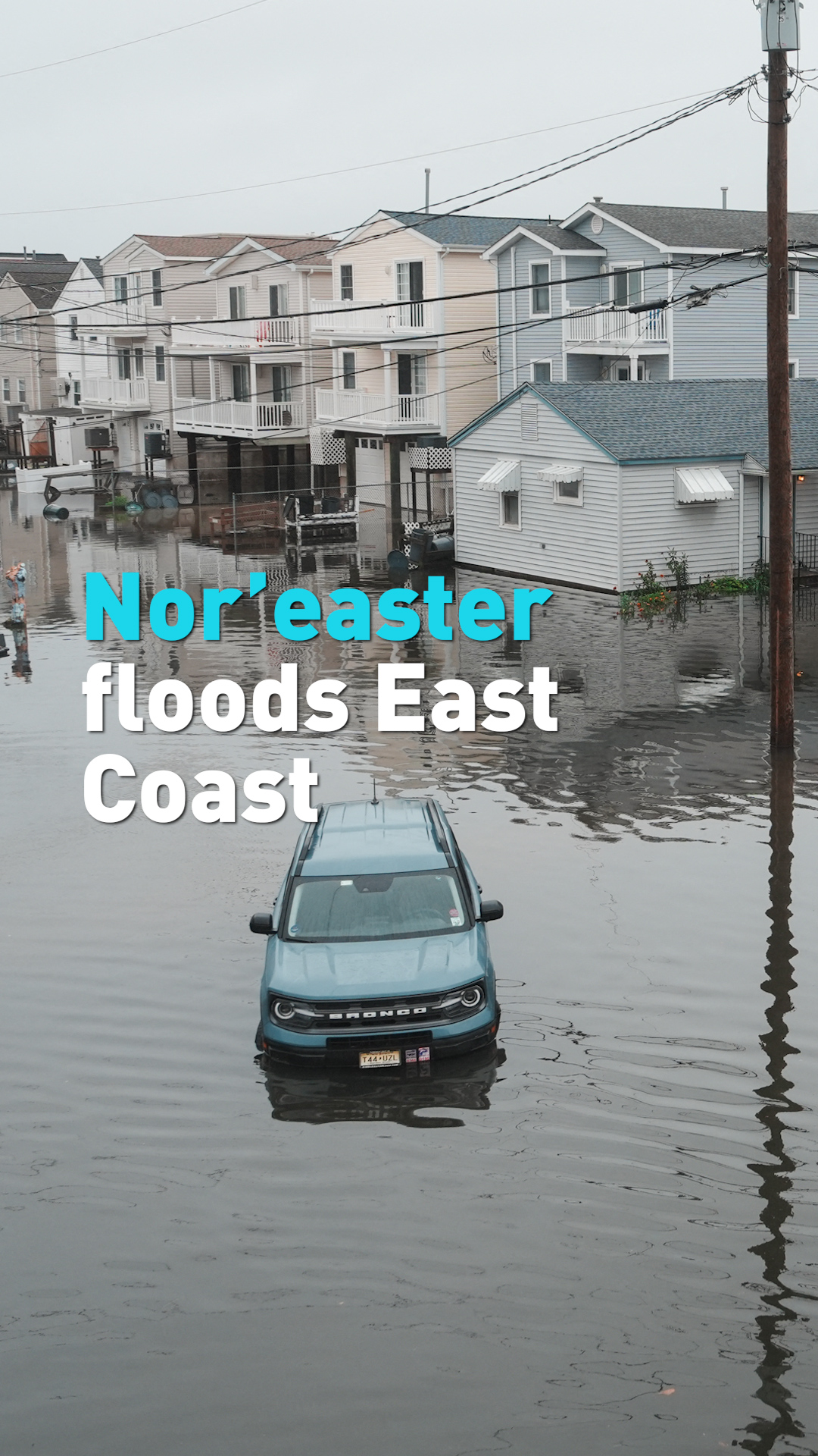 Northeast cities trudge through floodwaters after powerful nor'easter